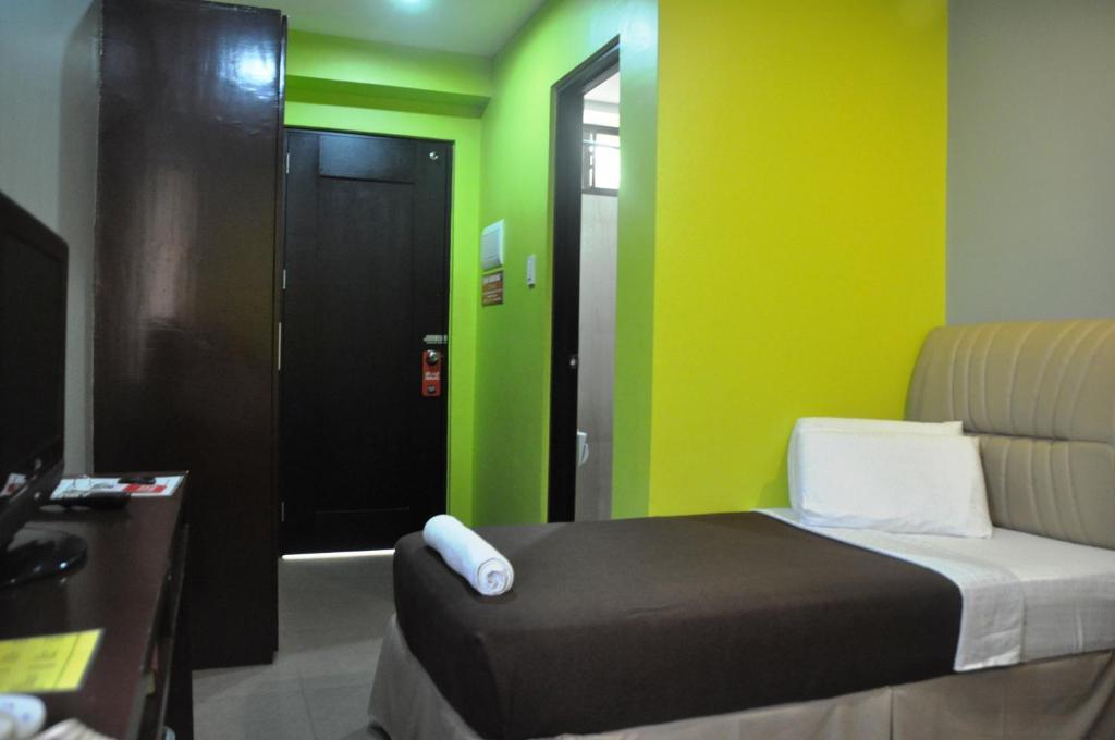 Hotel North Zen Basic Spaces à Davao City Chambre photo